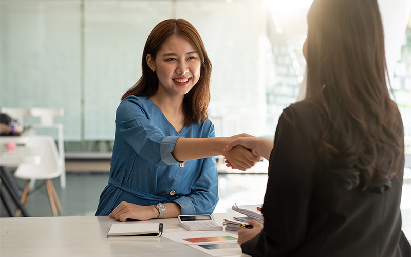 Woman securing a job after upskilling